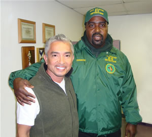 Derrick with Cesar Millan, the "Dog Whisperer"